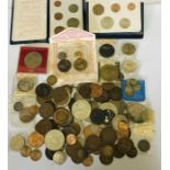 A collection of coinage including silver threepenny bits, £2 and £5 coins etc