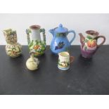 A collection of Torquay Ware including a vases, coffee pot etc