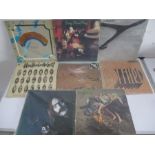 A collection of eight vinyl records including Wishbone Ash, Streamhammer, Roy Harper, Warm Dust,