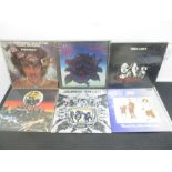 A collection of six Thin Lizzy vinyl records including Jailbreak, Black Rose, Bad Reputation,
