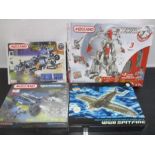 A collection of four boxed Meccano sets including a WW2 Spitfire, Space X-Plorer etc