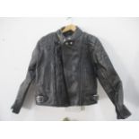 A leather motorbike jacket - label to arm "Ashman"