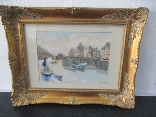 A watercolour of a Polperro harbour signed Frederick T W Cook