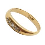 An 18ct gold diamond five stone ring
