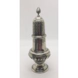 A French silver sugar shaker. Approx 23cm high