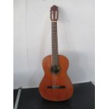 A Goya model 4-E Spanish six string acoustic guitar with carry case