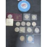 A Rabone tape measure, along with a 1935 crown and various commemorative coins