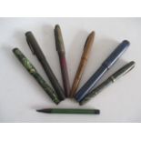 A collection of fountain pens including Conway Stewart, Summit, Burnham etc.- some with 14ct gold