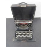 A S.I.M Italian typewriter in carry case