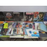 A collection of various vinyl records including soundtracks, classical, comedy, coloured vinyl, 7"