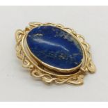 A 9ct gold swivel pendant set with a large blue agate.