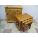 A small pine sideboard along with a nest of tables