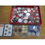 A collection of various coins, silver threepenny bits, Victorian Crown, £2 and £5 coins etc.