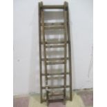 A vintage wooden stepladder