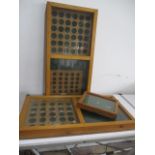 Two table top display cabinets along with one smaller version