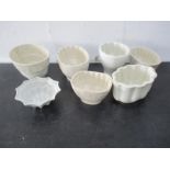 A collection of seven vintage jelly moulds