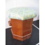A Victorian octagonal commode with upholstered seat