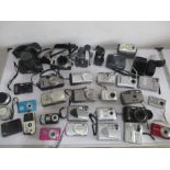 A collection of vintage camera's etc, including Canon, Olympus, Samsung, Nikon etc