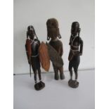 Three wooden African tribal figures