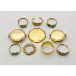 A collection of 18ct gold including a large wedding band, watch cases (one set with diamonds)