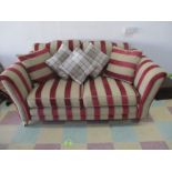 An Alston's two seater red & cream striped sofa