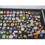 A collection of various badges