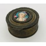 A Victorian lidded pot with a Vienna style porcelain plaque to top featuring a lady.