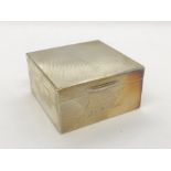 A hallmarked silver cigarette box