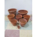 A collection of terracotta garden pots