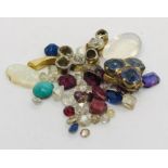 A quantity of loose gemstones including diamonds, sapphires, moonstone, opals etc.