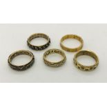 Five eternity rings, 9ct gold and "golsil". Total weight 13.7g