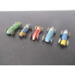 A collection of five unboxed Dinky racing car toys including two Ferrari's, Maserati etc