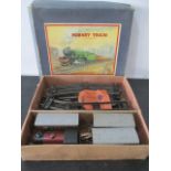 A boxed Hornby 101 tank passenger set, gauge 0 clockwork train, carriages and track- box A/F