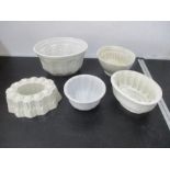 A collection of five vintage jelly moulds