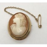 A 9ct gold cameo brooch with safety chain