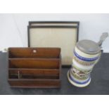 An Edwardian letter rack, a stein and a pair of frames