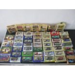 A collection of boxed die-cast vehicles including Lledo, Oxford etc