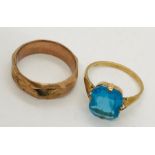 A 9ct gold dress ring with blue stone. Weight 1.9g. Along with a scrap 9ct ring. Weight 1.3g