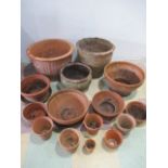 A collection of various terracotta pots