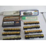 Bachmann n class 31860 loco along with a Bachmann BR class four loco 75029 and various carriages