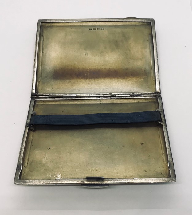 A hallmarked silver cigarette case. Weight 176g - Image 3 of 3