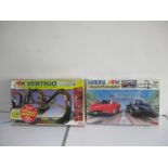 Two AFX racing games comprising of AFX Vertigo and AFX Aurora