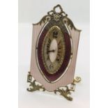 A silver and guilloche enamel dressing table clock with Masonic interest. Single diamond set in a