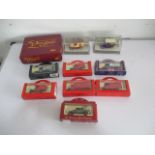 A small collection of boxed die-cast vehicles including Lledo The Queen Mother Commemorative set and