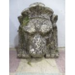 A reconstituted stone lion mask, 44cm