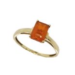 A 9ct gold ring set with a fire opal