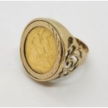 A 1912 half sovereign mounted in a 9ct gold ring (9.1g total)