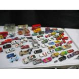 A collection of play worn die cast vehicles