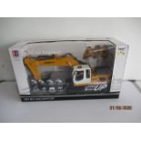 A boxed Double E Heavy Industry DIY Remote Control Excavator