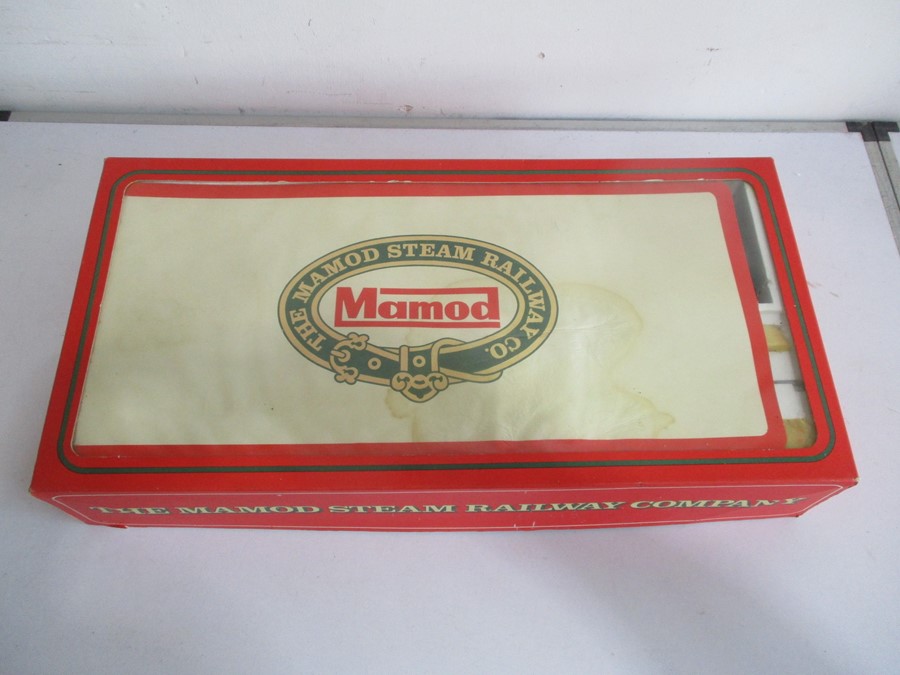 A boxed Mamod Steam Train Railway set including the locomotive, open wagon, lumber truck etc